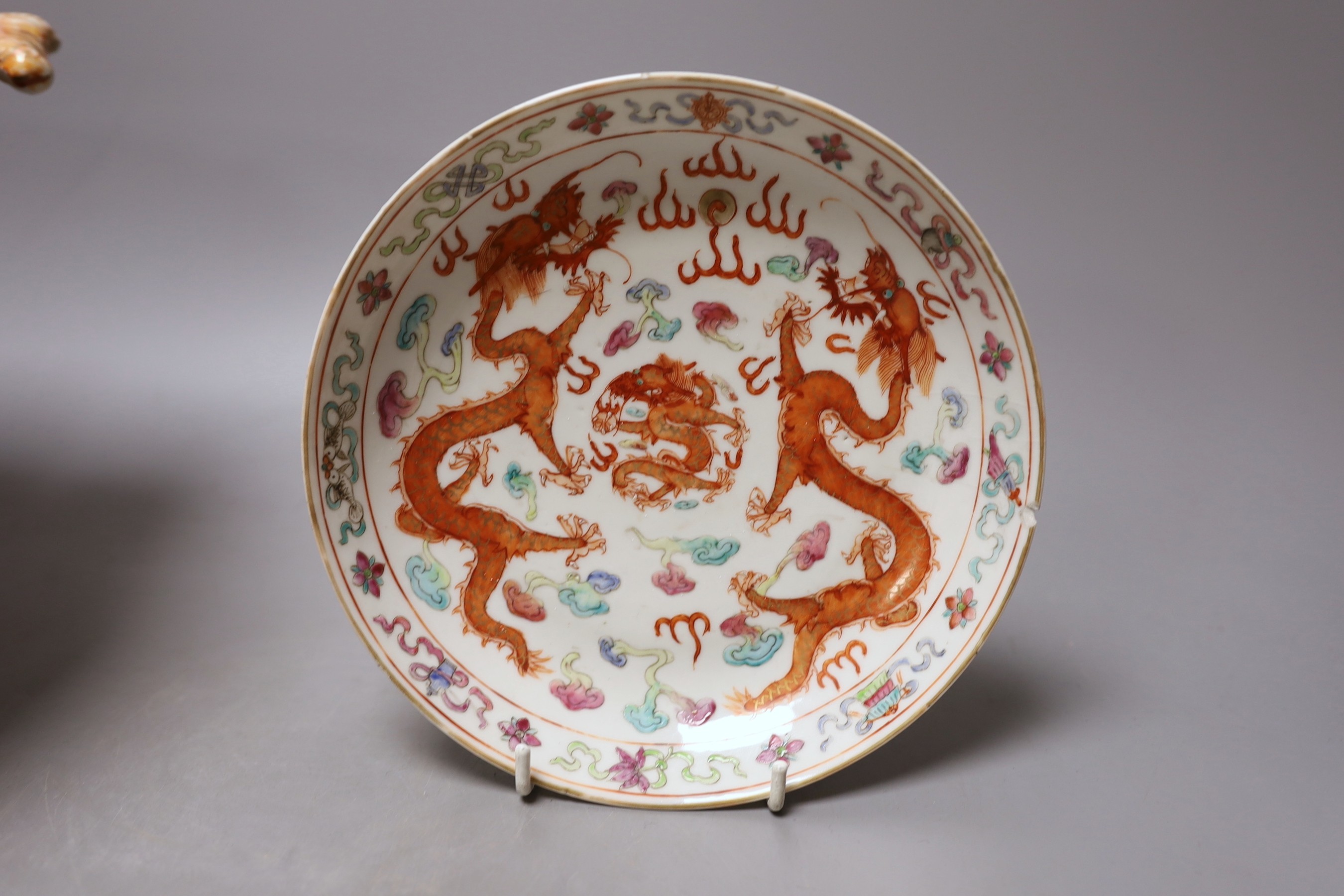 A Japanese red and white pedestal bowl, 19cm high, and a dragon pattern dish (2)